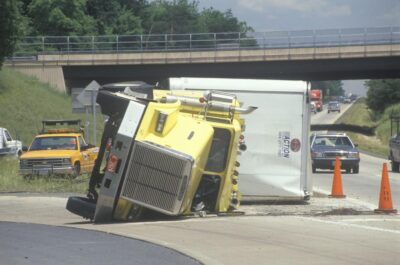 Overturned big rig by the highway