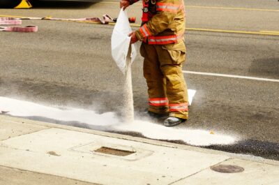 Fuel spill highway sign blocks road after i 285 semi crash