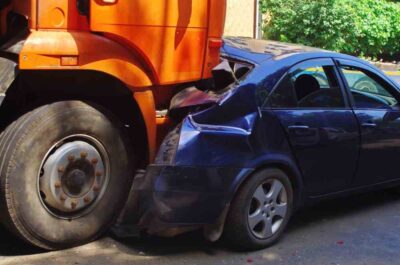 Large orange garbage truck