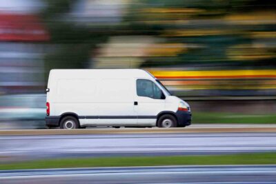 Moving van driving fast