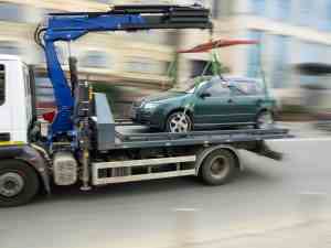 Tow truck driving fast