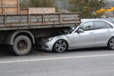 Car crashed into back of large truck