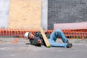 Fallen and injured construction worker