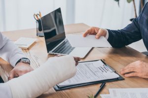 Injured man with lawyer form