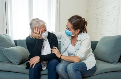 Daughter comforts grieving mother