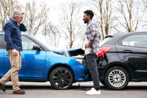 Drivers arguing after a rear end collision