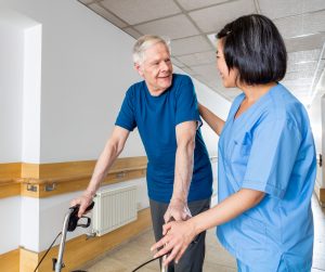 Elderly man doing physical therapy