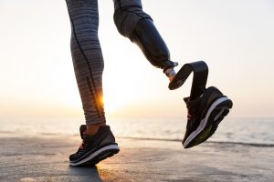 Female jogger with prosthetic leg