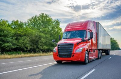 Truck speeds along road