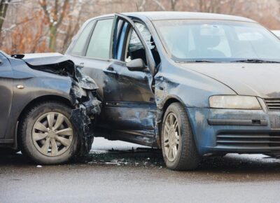 Two damaged cars after collision