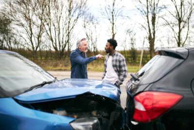 Two men argue after car accident