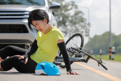 Asian girl in a bicycle accident