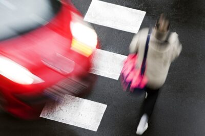 Blurred image of imminent crosswalk accident