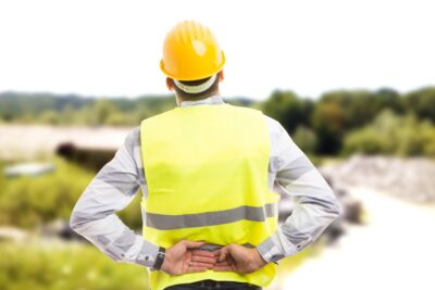 Construction worker with back pain