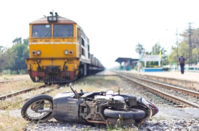 Crashed motorcycle on railroad tracks