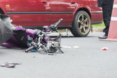 Crashed purple motorcycle