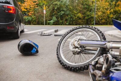 Motorcycle accident with helmet on the street