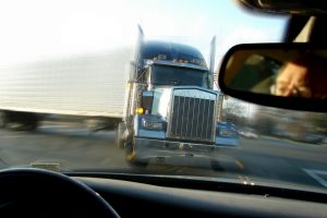 Motorist faces imminent crash with tractor trailer