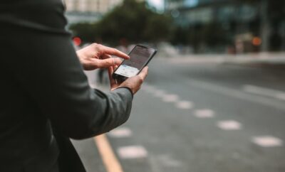 Person checking a rideshare app