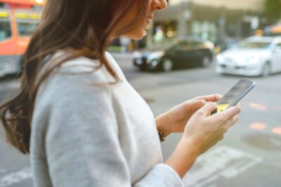 Woman holding a smartphone