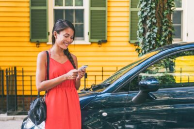 Woman ordering a rideshare service