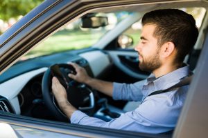 Young man accepting new passenger