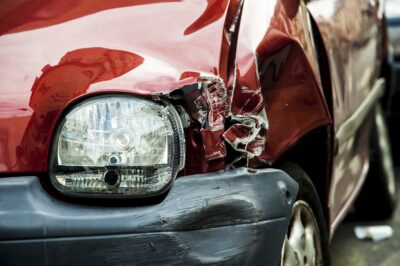 Black and red cars in an accident