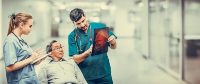 Injured man looks at brain scans