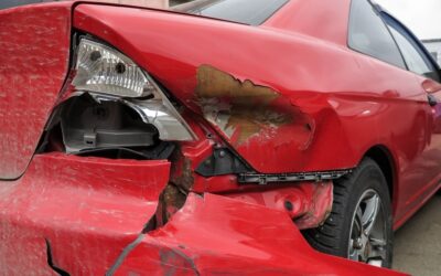 Red smashed up car