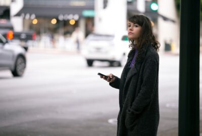 Woman waiting on rideshare