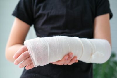 Woman with gauze on arm