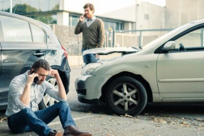 Men calling for help after an accident