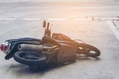 Motorcycle lying on the road