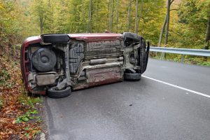 Overturned red car