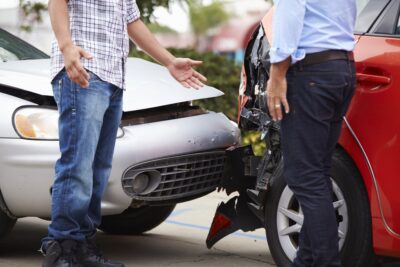 Two drivers arguing after an accident