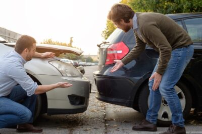 Two men arguing after a crash