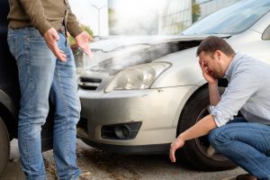 Two men arguing after an accident