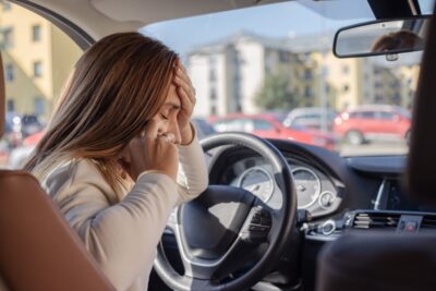 Woman calling for help after a car accident