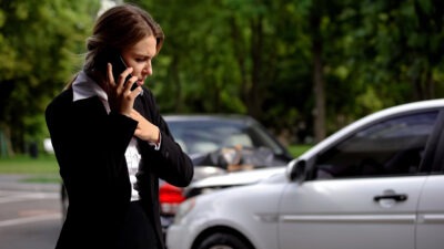 Woman driver calling for help scaled