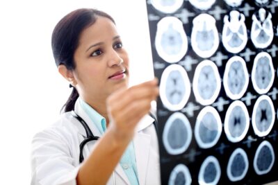 Female doctor examining brain