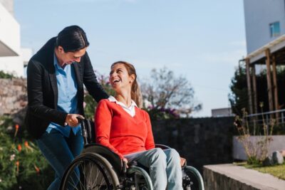 Woman in wheelchair smiling