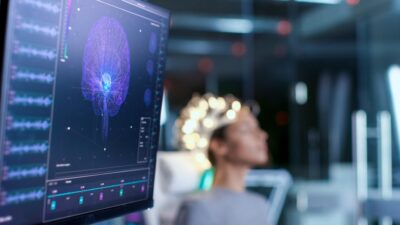 Woman wearing brainwave scanning headset