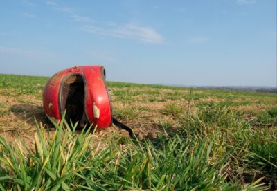 Abandoned helmet on side of road