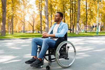 Black man in a wheelchair