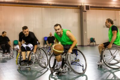 Disabled men playing basketball