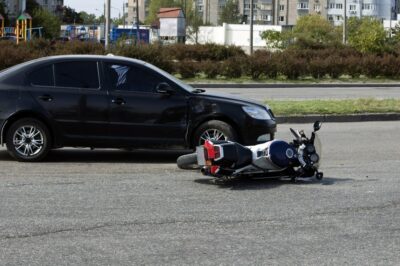 Car and motorcycle crash