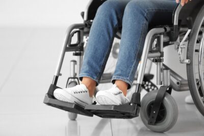 Close up on womans feet in wheelchair