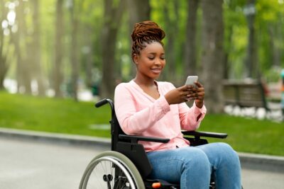 Handicapped black woman in wheelchair