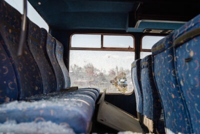 Smashed glass on bus seats scaled