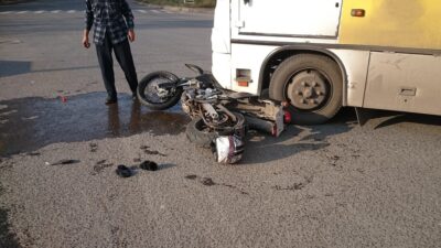 Bus and motorcycle crash